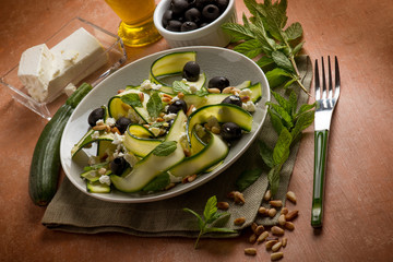 grilled zucchinis salad with feta cheese and olives