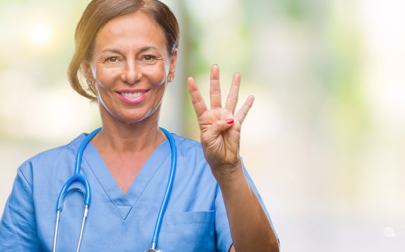 Middle age senior nurse doctor woman over isolated background showing and pointing up with fingers number four while smiling confident and happy.