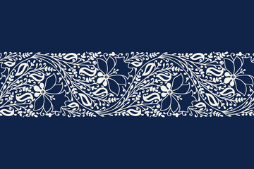 Indigo dye woodblock printed seamless ethnic floral border. Traditional oriental ornament of India, garland of flowers and leaves, ecru on  navy blue background. Textile design. - 222640913