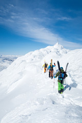 Fototapeta na wymiar backcountry skiers in the mountains - gaustatoppen, norway