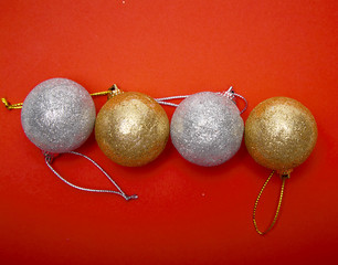 Christmas balls on red papar