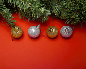 Christmas balls on red papar