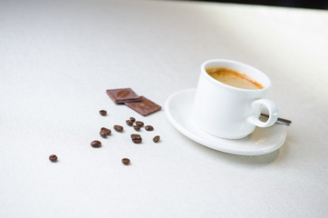 Cappuccino coffee cup closeup at the table
