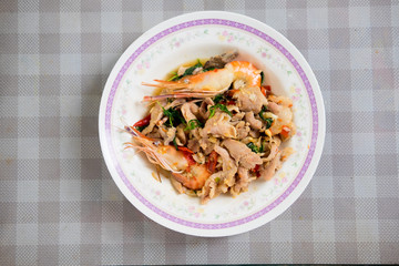 Stir-fried of pork and shrimp mix with basil leaf