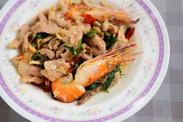 Spicy stir fried pork and shrimp with basil leaf