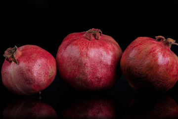 pomegranates on a black background