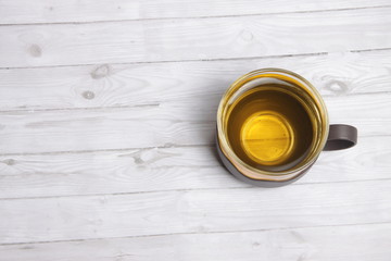 cup of tea on a white wooden table