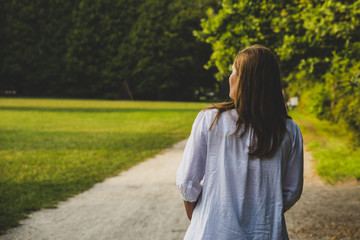 lonely mature pregnant woman in the park