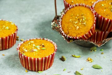 Homemade Mango Cardamom Muffins or Cupcakes close up, selective focus