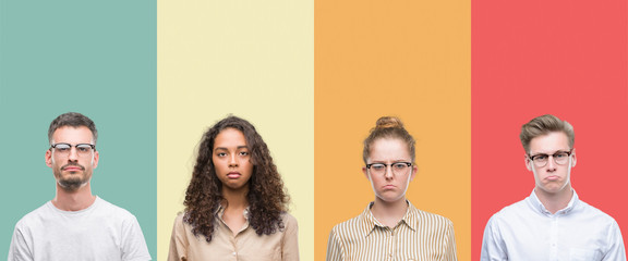 Collage of a group of people isolated over colorful background depressed and worry for distress,...