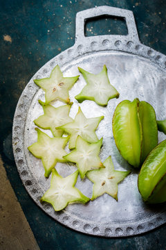 carambola on a metal plate