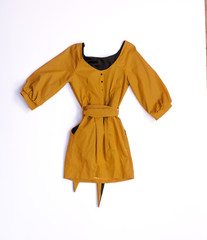 yellow cocktail dress on white isolated background