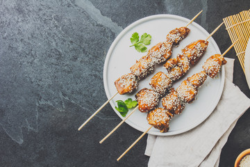 Teriyaki chicken skewers with rice. top view. Asian view