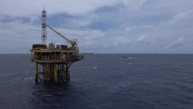 Scene of the oil field drilling rig and offshore platform