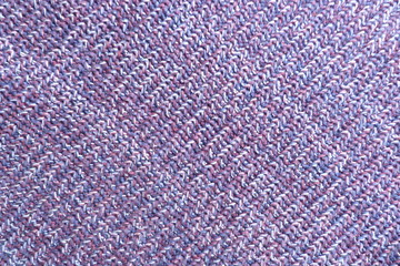 knitted purple knitted wool fabric closeup melange