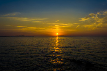 Beautiful sunset at Logas beach at Peroulades village of Corfu island, Greece