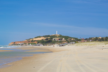 Fototapeta na wymiar Lighthouse in white hill in Ceará Brazil