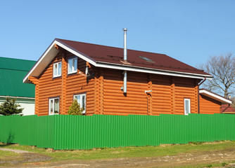Obraz premium New wooden house, spring