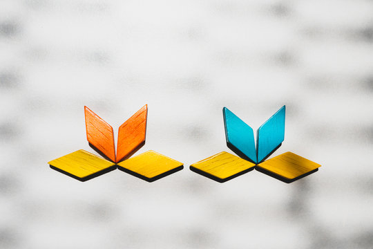 Tangram puzzle flower shape use for education and creative concept