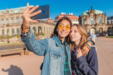 Woman Tourist couple friends at Zwinger palace in Dresden, travel or study in Europe concept