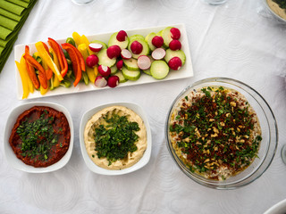 A mix of arabic food together with vegetables