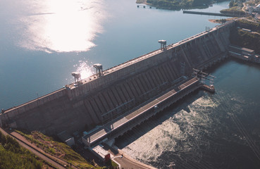 Krasnoyarsk hydroelectric station dam, hydro power plant on Enisey river from aerial view....