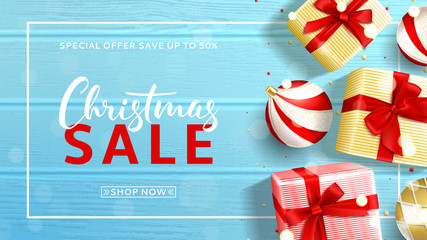 Beautiful banner for Christmas sale. Elegant background with top view on realistic gift boxes and Christmas balls on rustic wooden texture. Vector illustration with confetti and effect bokeh.