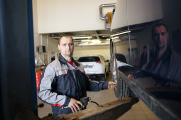 Mechanic at work in his garage