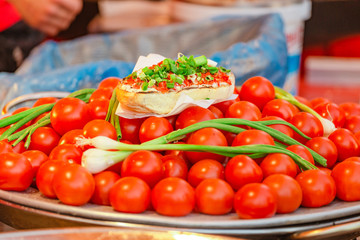 Ripe fresh harvested vegetables Onions and tomatoes for sale at market