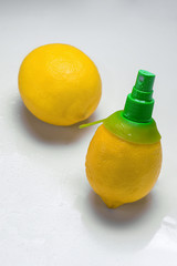 citrus spray in lemon on a white background