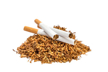 Pile of cut tobacco with cigarettes on white background.