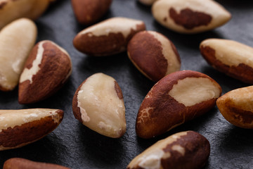 brazil nut on a dark stone background