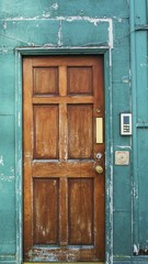 A tipical brown old wooden door in Dublin of a local house