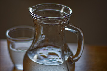 on a hot Sunny day, a pitcher of ice water for you and your friend