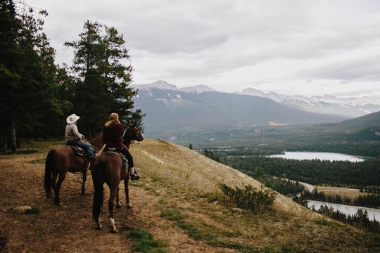 horseback riding in the mountains