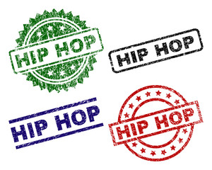 HIP HOP seal prints with corroded texture. Black, green,red,blue vector rubber prints of HIP HOP text with corroded texture. Rubber seals with round, rectangle, rosette shapes.