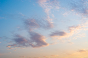 Obraz na płótnie Canvas Magnificent cloudy summer sky with sunset or sunrise colours