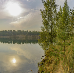 Fototapeta premium Artificial lake formed after the removal of sand. Closed sand quarry.