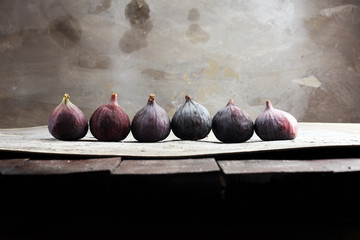 Fresh figs. Food Photo. whole figs on rustic background.