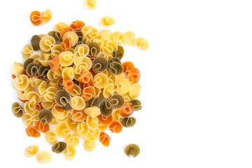 A stack of three colors pasta (in form of mushrooms) on white background (isolated). Top view.