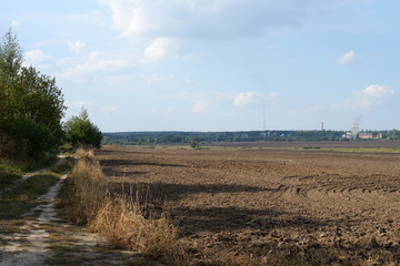 road near a plowed field