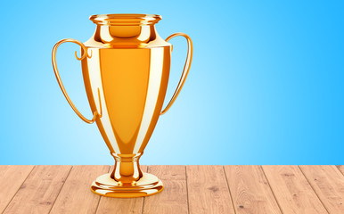 Gold trophy cup award on the wooden table. 3D rendering