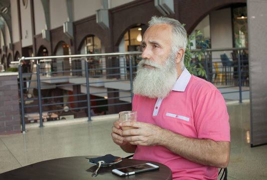 Coffee Cafe Bar Leisure Drinking Relaxation Concept. Senior beard.