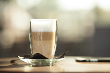 cup of coffee on table in coffee shop cafe