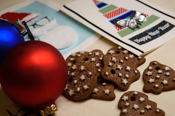 Obraz na płótnie Canvas Christmas decorations, cookies, postcards, candles and balls