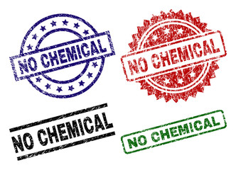 NO CHEMICAL seal prints with damaged style. Black, green,red,blue vector rubber prints of NO CHEMICAL caption with grunge surface. Rubber seals with circle, rectangle, rosette shapes.