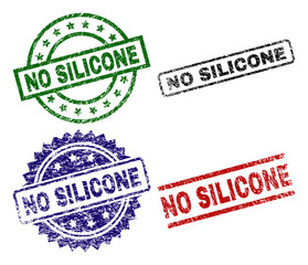 NO SILICONE seal prints with distress texture. Black, green,red,blue vector rubber prints of NO SILICONE text with dirty texture. Rubber seals with round, rectangle, rosette shapes.