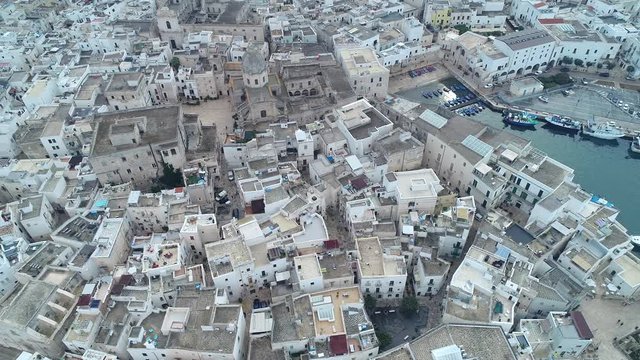 Aerial video. Old Town of Monopoli - city on Adriatic Sea. Italy. 4K