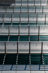 Abstract Of Sun Screens And Shadows On A Building