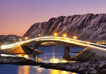 Bridge and reflection on the water surface. Natural landscape in the Lofoten islands, Norway....
